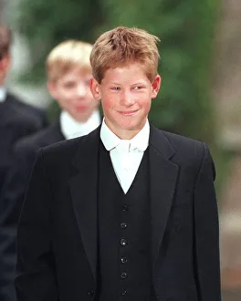 PRINCE HARRY STARTS AT ETON, SMILING WEARING COAT TAILS - SEPTEMBER 1998