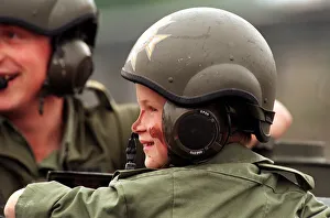 PRINCE HARRY IN UNIFORM IN A TANK VISITING THE LIGHT DRAGOON BARRACKS IN GERMANY