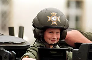 01478 Prints: PRINCE HARRY IN UNIFORM IN A TANK VISITING THE LIGHT DRAGOON BARRACKS IN GERMANY