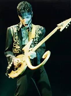 Prince performing on stage during his Ultimate Live Experience Tour