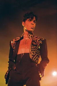 Prince performing on stage during his Ultimate Live Experience Tour