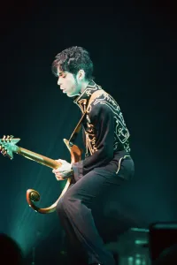 Prince performing on stage during his Ultimate Live Experience Tour