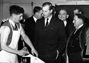 01035 Prints: Prince Philip, Duke of Edinburgh chats to a carpentry student, Brian Locke