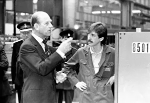 Prince Philip, Duke of Edinburgh, chats to tool maker Alan Lake at NEI Parsons Factory in