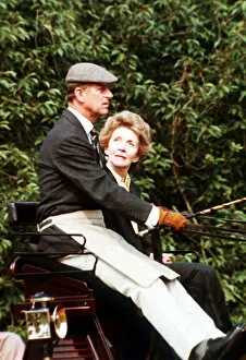 Images Dated 8th June 1982: Prince Philip, the Duke of Edinburgh and Nancy Reagan sitting in a carriage driving in