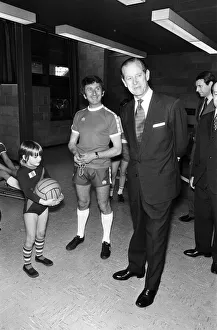 Prince Philip, Duke of Edinburgh at Redditch YMCA with seven-year old Sally Owen