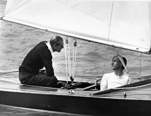00075 Prints: Prince Philip, Duke of Edinburgh, sails Coweslip at Cowes with crewman John Collis