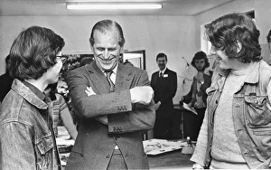 Prince Philip, Duke of Edinburgh, shares a joke with youngsters to the Eskdale Outward