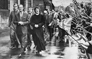 Prince Philip, Duke of Edinburgh, walks with Rev Graham Trasler