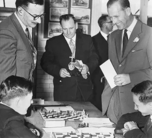 Chess Prints: Prince Philip, Duke of Edinburgh, watches as Kenneth Wood, left