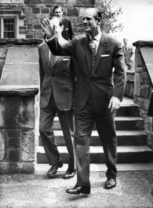 00078 Prints: Prince Philip, Duke of Edinburgh, waves to the crowd as he leaves Washington Old Hall