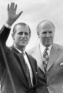 Prince Philip, Duke of Edinburgh, waves as he lands at Usworth Airport