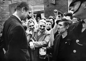 00058 Prints: Prince Philip touring the central redevelopment area and shopping centre in Salford