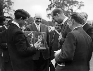 01037 Prints: Prince Philip visiting Wales. David De Lloyd presents HRH with a modernistic ashtray