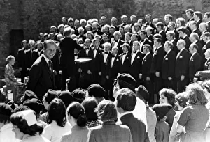 01038 Prints: Prince Philip visiting Wales. The Duke of Edinburgh smiling at local children as