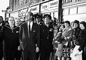 As Prince Philip walks through Billingham Square Shopping Centre he looks at the new two