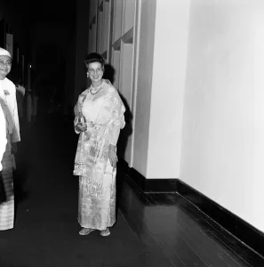 Princess Alexandra of Kent wearing a traditional Burmese costume at a private dinner in
