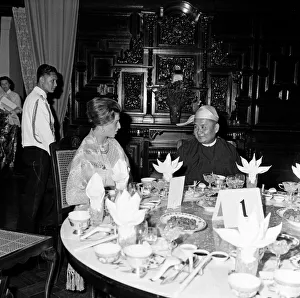 Princess Alexandra of Kent wearing a traditional Burmese costume at a private dinner in