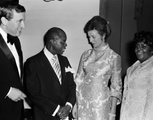 Princess Alexandra meets Louis Armstrong at a private party at the Savoy Hotel, London