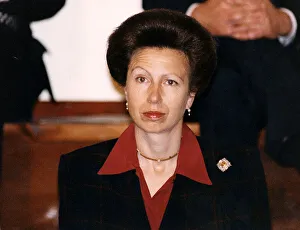 Princess Anne in Aberfoyle open necked red shirt collar outside black jacket brooch gold