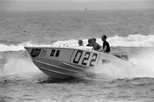 01491 Prints: Princess Anne driving a speed boat called Who Dares around Monte Carlo Bay alongside