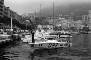01491 Prints: Princess Anne driving a speed boat called Who Dares around Monte Carlo Bay alongside