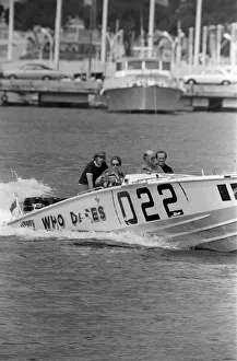 01491 Prints: Princess Anne driving a speed boat called Who Dares around Monte Carlo Bay alongside