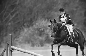Princess Anne, The Princess Royal, competing in a showjumping event t Windsor Great Park