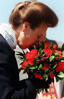 Princess Anne smells bouquet of flowers at opening of Gardening Festival Strathclyde Park