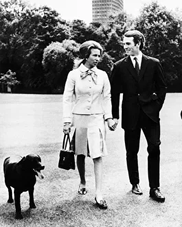 Princess Anne walking with her fiance Mark Phillips after the announcement of
