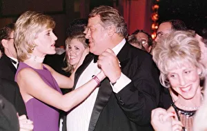 Princess Diana dances with American millionaire tool manufacturer Michael Wilkie at a