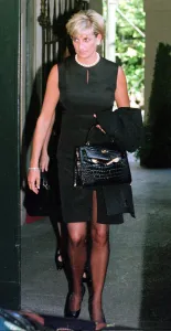 Overseas Prints: Princess Diana leaves the home of slain Italian fashion designer Gianni Versace in