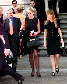 Princess Diana leaves a memorial service for slain Italian fashion designer Gianni