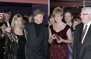Princess Diana meeting Paul McCartney and his wife Linda after a performance of his