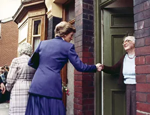 Cleveland Prints: Princess Diana seen here shaking the hand of an elderly resident during her visit to