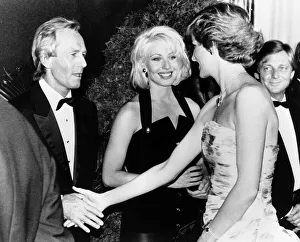 Ties Prints: Princess Diana shakes hands with Australian actor Paul Hogan at the premiere of his film