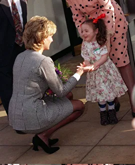 Emotions Prints: Princess Diana shaking the hand of a youngster who attends the Institute for Conductive