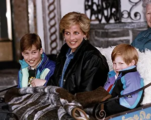 Princess Diana with her two sons Prince William and Prince Harry about to go on a sleigh