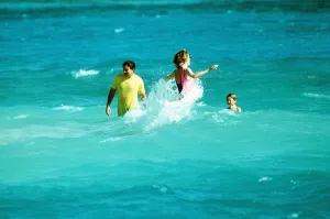 British Virgin Islands Prints: Princess Diana with her sons Prince William and Prince Harry take a swim in the sea with