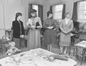 01016 Prints: Princess Diana with staff at the Bovey Tracey Church Playgroup in 1983