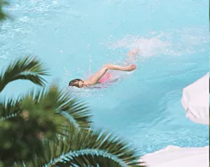 Heat Prints: Princess Diana swimming in the pool while on holiday at Richard Branson