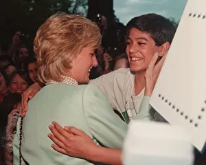 PRINCESS DIANA, WEARING A GREEN JACKET IS GREETED BY DAVID STUDNITZER DURING HER VISIT TO