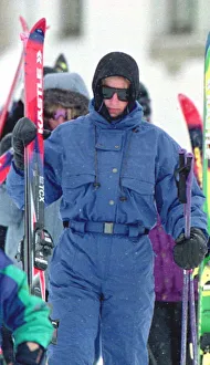Princess Diana wearing ski-ing outfit and balaclava and sunglasses during a ski-ing