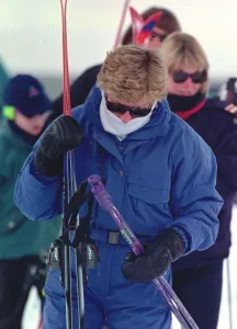 Princess Diana wearing ski-ing outfit and sunglasses during a ski-ing holiday with her