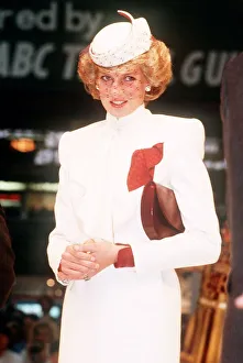 Opening Prints: Princess Diana, wearing a white ensemble with red accents