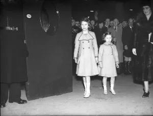 00004 Prints: Princess Elizabeth and her sister Princess Margaret arrive at the theatre, circa 1940