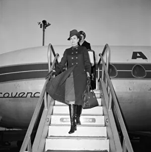 01094 Prints: Princess Grace arrives at Heathrow Airport today from Monaco