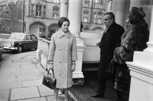01094 Prints: Princess Grace of Monaco and her husband Prince Rainier III leaving the Connaught Hotel