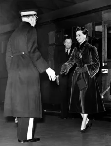Three People Prints: Princess Margaret is greeted by Viscount Allendale as she steps from the train