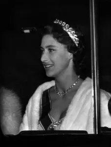 Necklace Prints: Princess Margaret leaves Clarence House October 1955 to dine with the Queen Mother